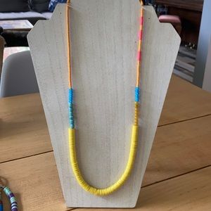 Handmade African vinyl beaded necklace.